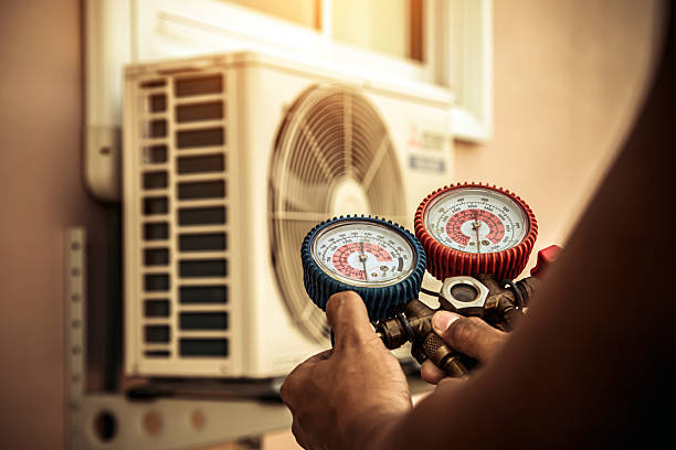 Professional Air Conditioning Service technician working in Decatur, TX